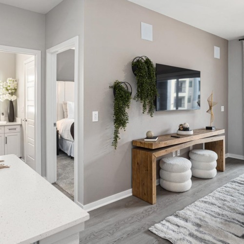 a large room with a bed and a desk