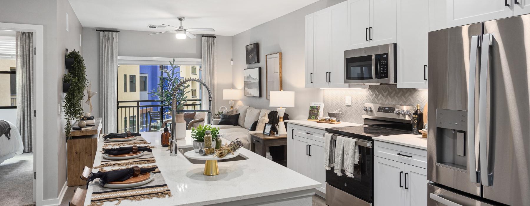 a kitchen with white cabinets